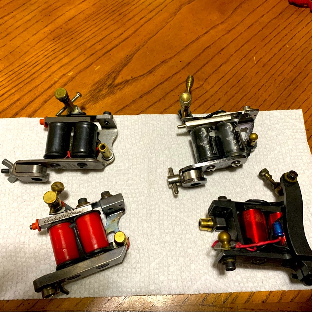 Lot of 4 Coil tattoo machines. All in great condition .